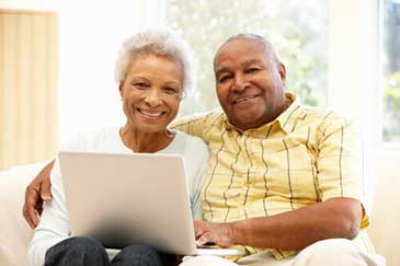 Smiling elderly couple