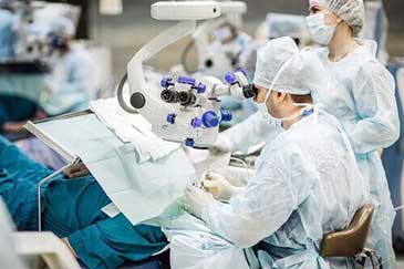 Surgeons preforming surgery