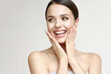 Smiling young woman after receiving Oculofacial Surgery